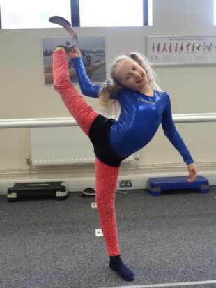 Pollyanna dancing with her activity blade. 